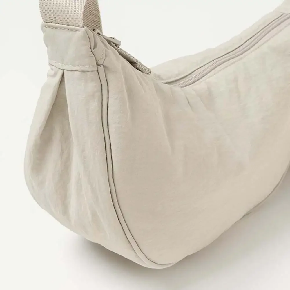 Uniqlo Round Mini Shoulder Bag in Beige